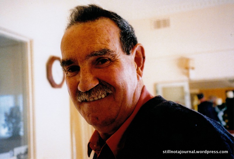 Dad, smiling at Mum.