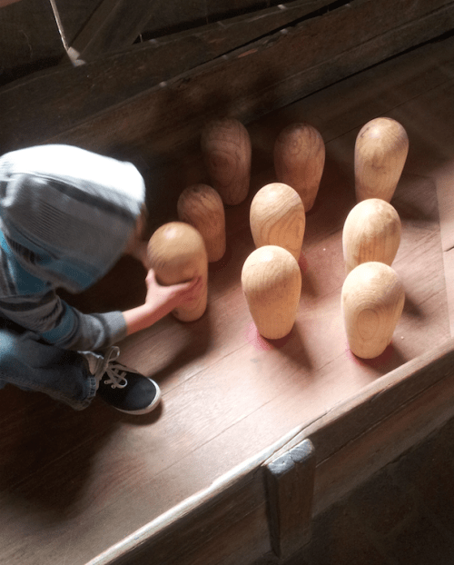 Self-setting bowling pins, 1850s style.