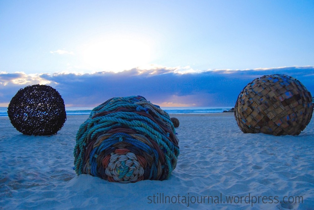 Relics from Atlantis, Ben Carroll. I love it. Looks like perfect spheres of ocean flotsam left by the tide.