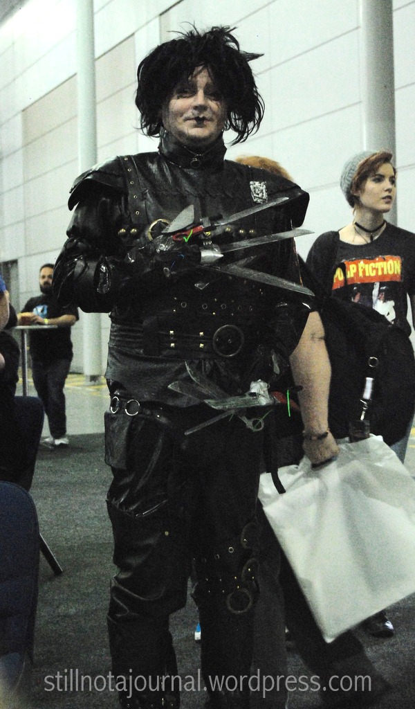 I'm impressed this guy managed to get through the weapons security at the door. I spose footlong blades are okay as long as they aren't *concealed* weapons.