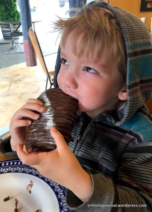 Roars, modelling a read-to-scoff chocolate pastry.